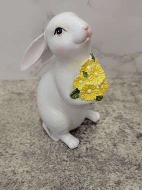 Bunny Rabbit holding a bouquet of flowers